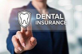 Person touching “dental insurance” icon