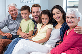 Three generations of family smiling