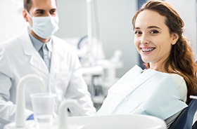 Smiling dental patient, happy she could afford braces