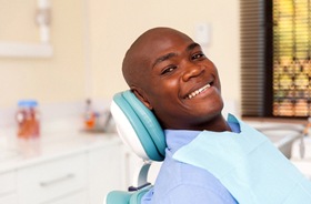 Dental implant patient attending routine cleaning and checkup