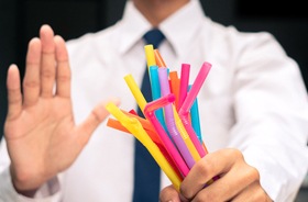 Man saying no to drinking straws after dental implant surgery