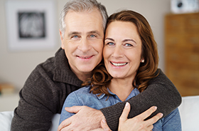 Smiling older man and woman