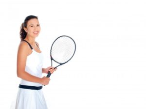 Young woman with orthodontics in Woodbridge holding tennis racket