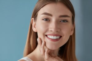 Woman with beautiful smile after free whitening in Woodbridge