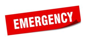 Red emergency sign with white lettering